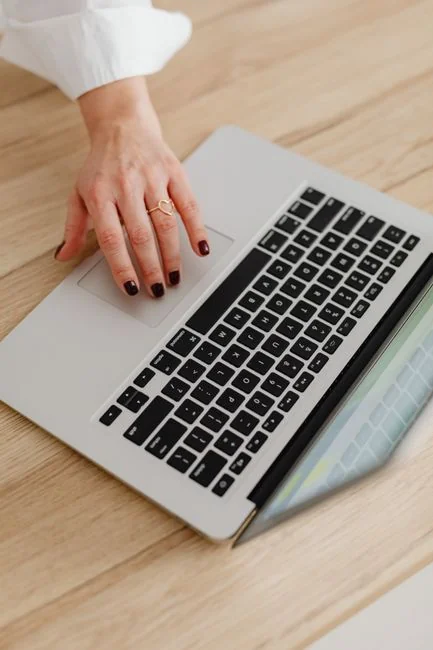 Focus on employer branding with documents on a wooden desk, ideal for business concepts.